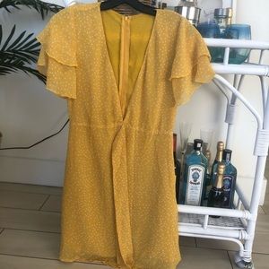 Yellow polka dot wrap dress